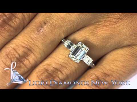 ER-0929 - 3.08 Carat F-VS1 Emerald Cut Three Stone Diamond Engagement Ring Set In Platinum