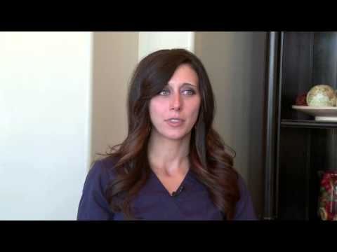 My toddler holds food in her mouth and just drools. How can I get her to stop?