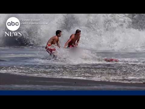 Lifeguard heroes rescue young swimmer from rough surf