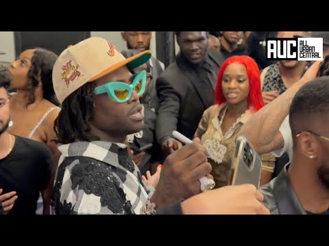 Sexyy Red Waits Patiently For Chief Keef While Passing Out $100 Bills To Fans