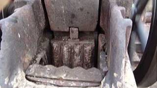 antique rock crusher powered by tractor