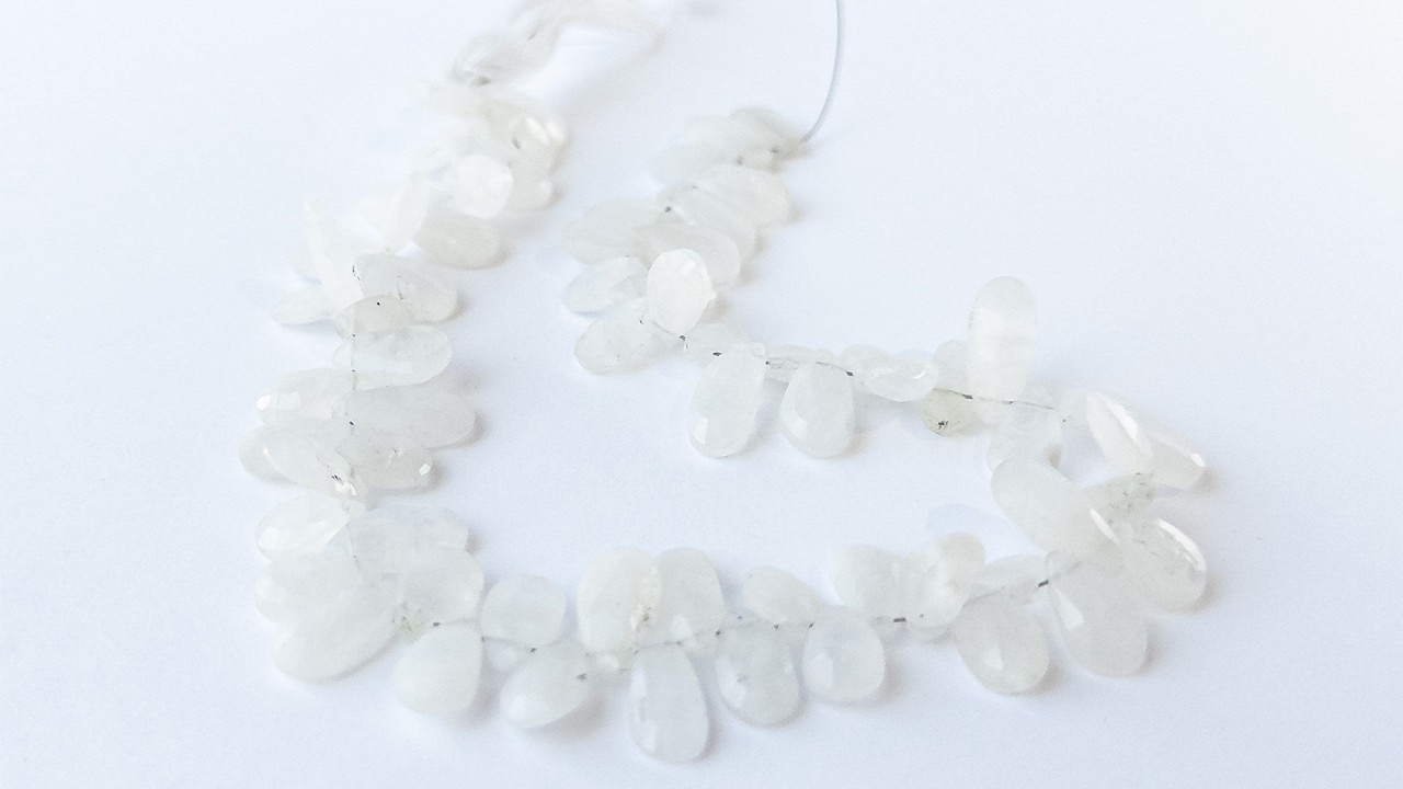 Rainbow Moonstone | Faceted Briolette | 6.5-7mm Bead Size | 28cm Strand Length | 65 Pieces video