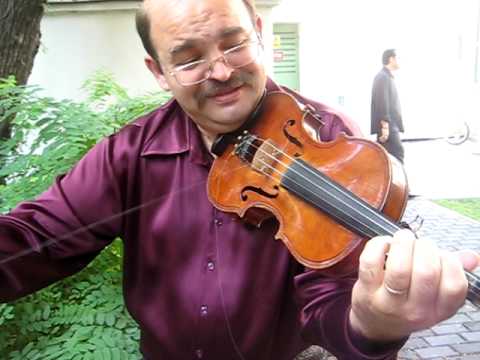 Marin Bunea shows off an old fiddlers trick