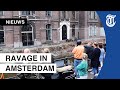 Beelden: kademuur Amsterdam deels ingestort