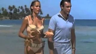 Ursula Andress (Honey Ryder) in bikini walking Jamaica's  Dunn's River beach in Dr No 1962