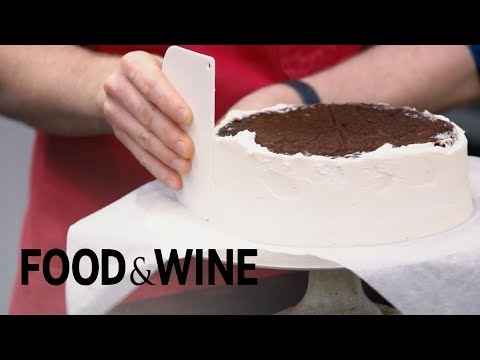 Part of a video titled Icing Your Cake Upside Down For a Professional Look | Food & Wine
