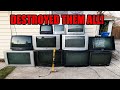 SMASHING A WALL OF GIANT TVS DESTROYING ELECTRONICS