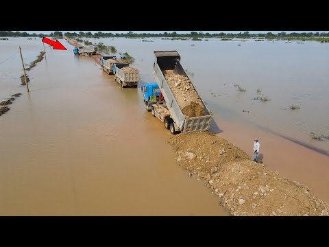 Nice Updating Using Bulldozer and Huge Dump Truck Working Building Road Long Crossing Flood