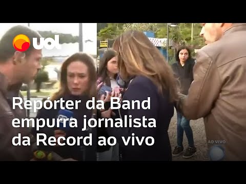 Band reporter pushes Record journalist during live broadcast; video shows the moment
