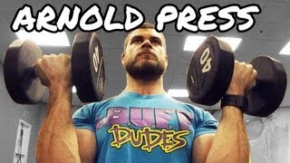 Video de entrenamiento de press arnold para fortalecer hombros