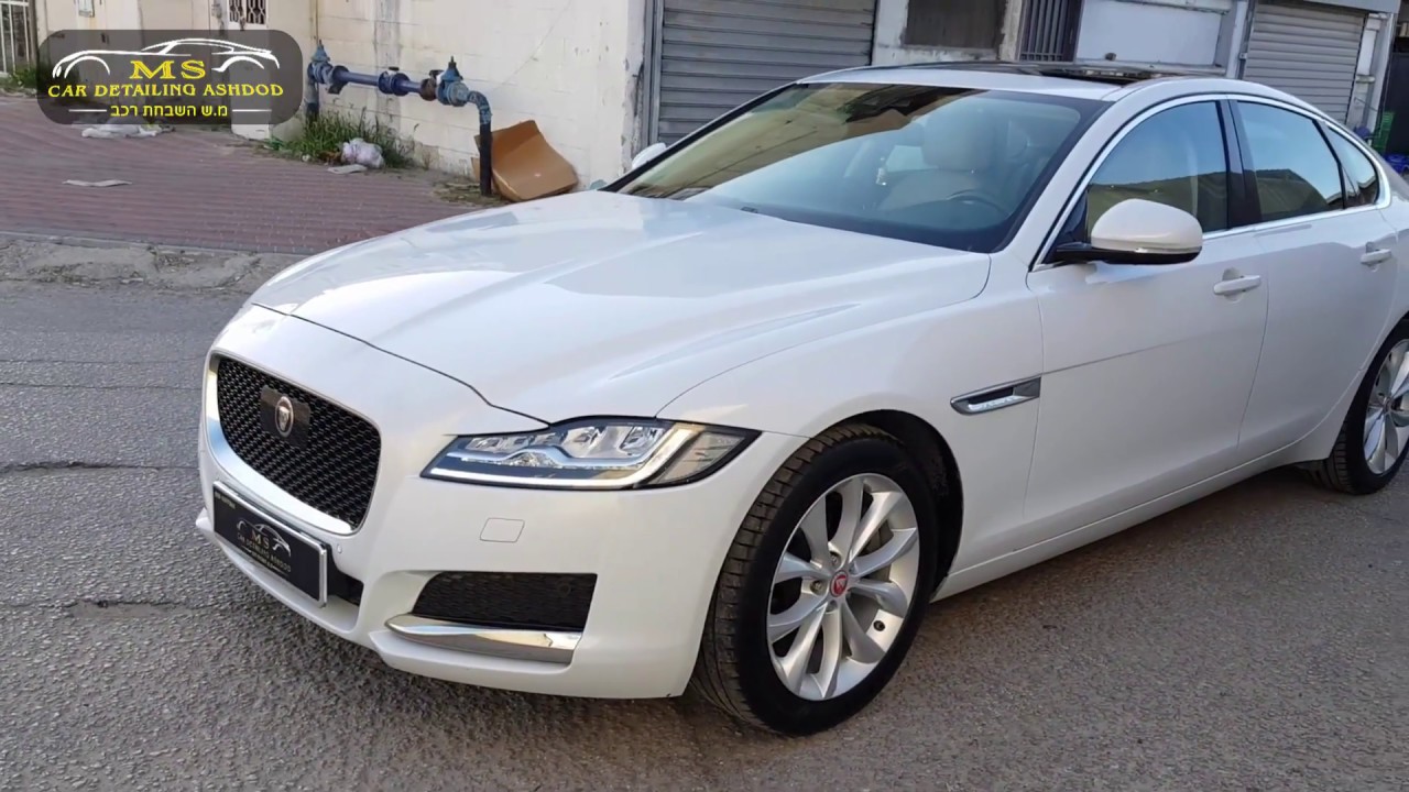 יגואר XF לבנה לאחר טיפול דיטיילינג לרכב הכולל פוליש רב שלבי וציפוי ננו קרמי