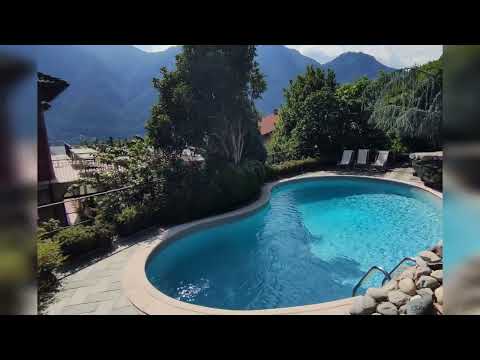 In vendita proprietà di pregio con enorme giardino e piscina privata sul Lago di Como
