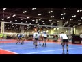 #30 blocking the opponents middle hitter