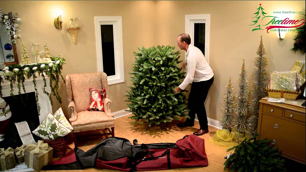 Artificial Christmas tree storage demonstration with GreensKeeper storage bag