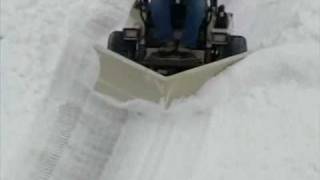 preview picture of video 'V-Plow Snow Removal Attachment | Grasshopper Mowers'