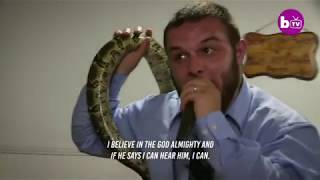Horror moment US pastor is bitten by a deadly snake during a service leaving him drenched in blood