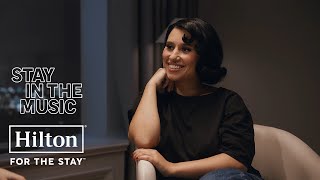 Hilton Garden Inn Checking-in with RAYE (Full Interview)