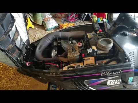 how to install a new battery in a Polaris Indy classic touring 1997