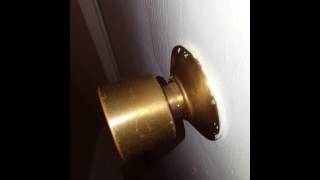How to remove door knob without exposed screws!