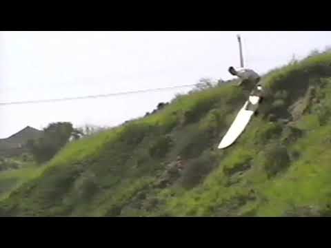 Swellmagnet.com - Hellman Rory Parker tackles an iceplant laden hill on a finless longboard!