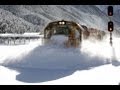 Spectacular footage Train plowing through deep ...