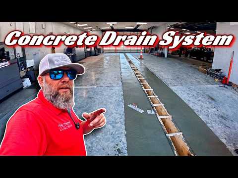 Forming and Pouring a New Concrete Drain System at a Busy Car Dealership