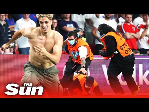 Fans boo as pitch invader stops play at Euro 2020 final between England & Italy