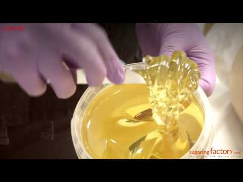 How to get sugaring paste from a jar with a steel spatula?