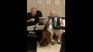 Hobo Bob Kindschi fooling around with accordion