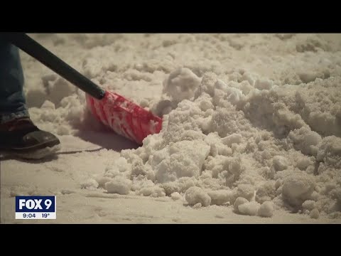 Big Mess: Cleanup continues in the Twin Cities after winter storm slams Minnesota