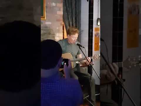 Conan O'Brien surprises people with a song in Belfast Bar