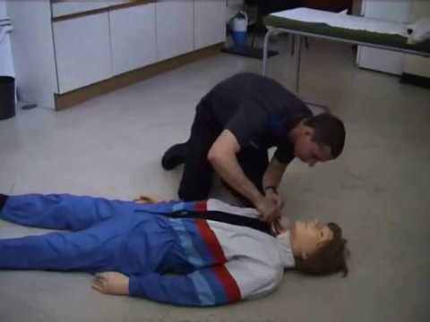 mannequin-man performming as a CPR Dummy: Training sequence using "danny cpr mk II" in basic life support course, student using DRABC mnenonic, checking Danger, Response, Airway, Breathing and Circulation for West Mids Fire Service on 28/03/2003