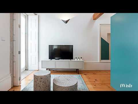 This charming T1 mezzanine apartment offering historical character and excellent profitability.