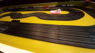 4 lane HO slot car racing track on a door ! Easy to build, transport and store !