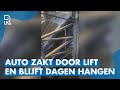 Auto ZAKT DOOR parkeerlift in ONDERGRONDSE GARAGE en BUNGELT al DAGEN tussen verdiepingen
