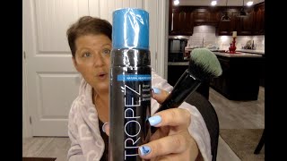 ST.TROPEZ SELF TAN BRONZING MOUSSE IN DARK APPLICATION.