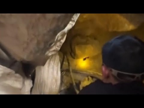 5 miners found alive inside flooded Laos cave, 2 remain missing, rescuers say