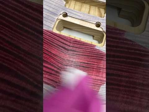 Watch how our multi-step finishing process for our Raspberry Jam finish is done! #guitar #staining