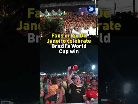 Fans in Rio De Janeiro celebrate Brazil's World Cup win against Haiti