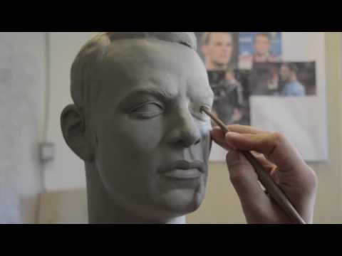 Sculpting a head in clay