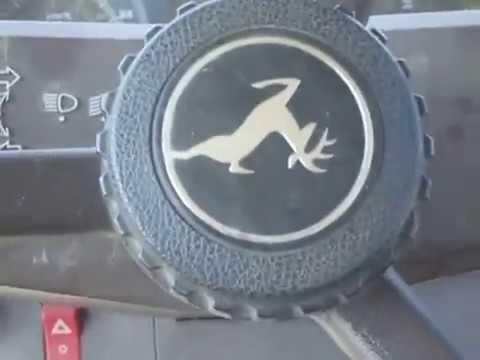 met de volle wagen stroo over het land