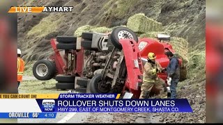 One-way traffic control in place on Highway 299 after semi truck rollover crash