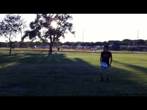 Aaron tries to catch a frisbee with his mouth