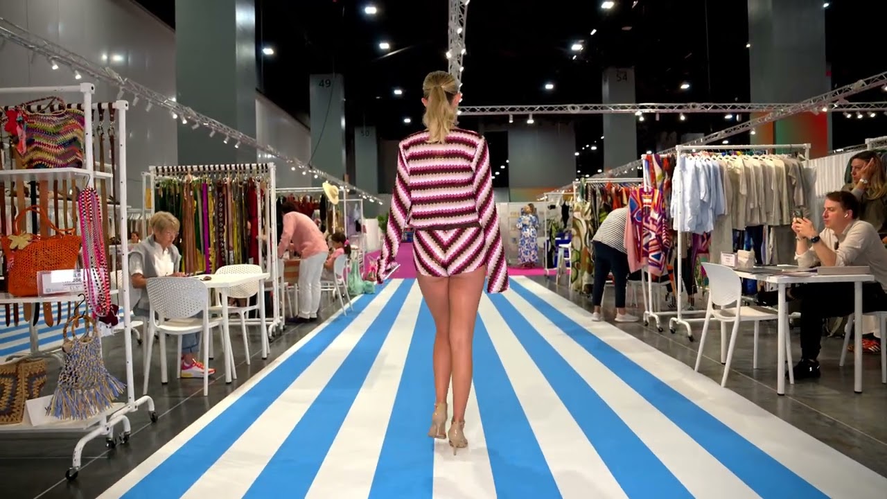 We get a tour of the Cabana Swim Show /Miami Beach Conv. Center by swimsuit model Emeline Smith
