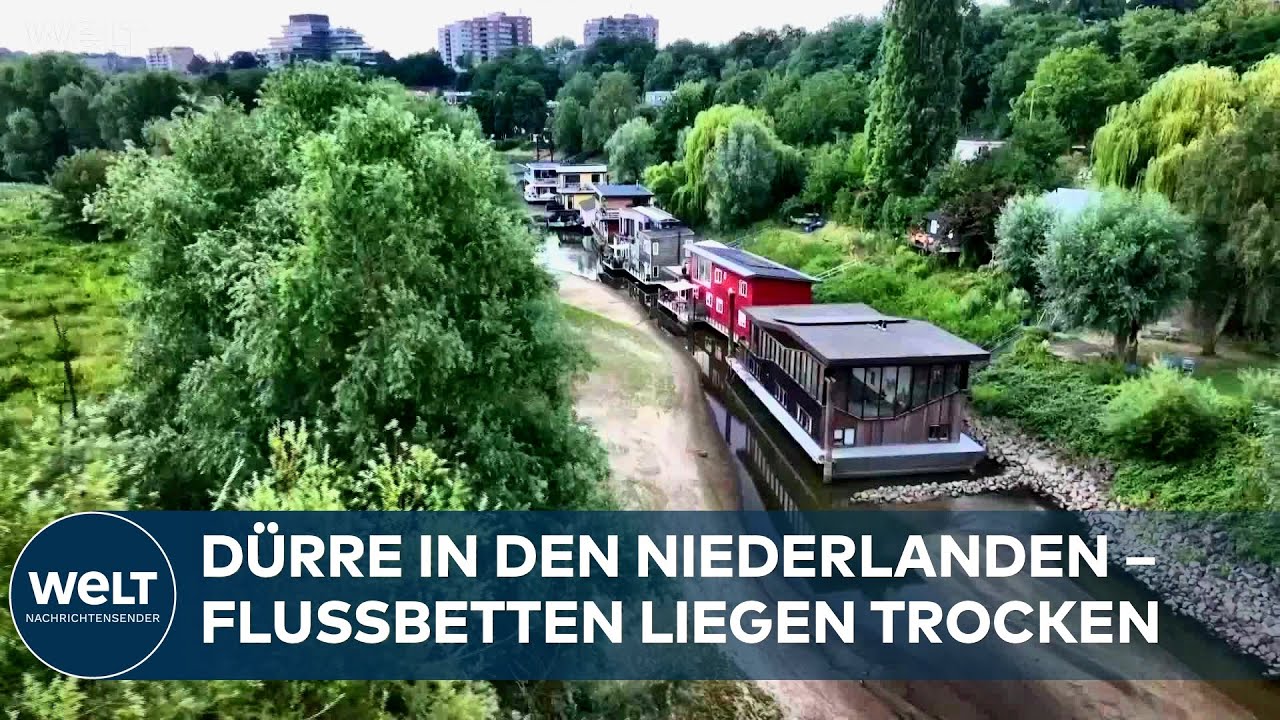 NIEDERLANDE: Heftige Dürre! Hausboote sitzen auf dem nackten Flussgrund