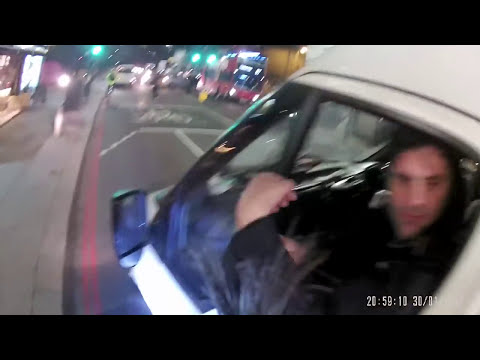 Two muppets attack a cyclist