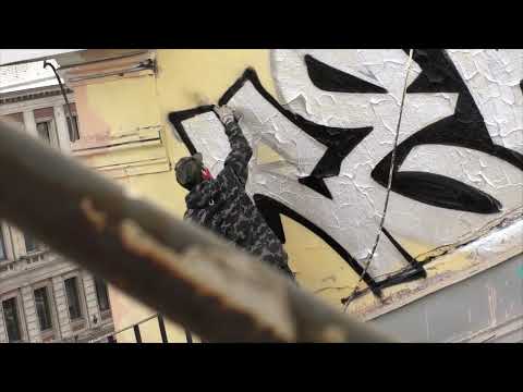 Graffiti bombing .Rebel813. Rooftop graff. Full process. Daylight