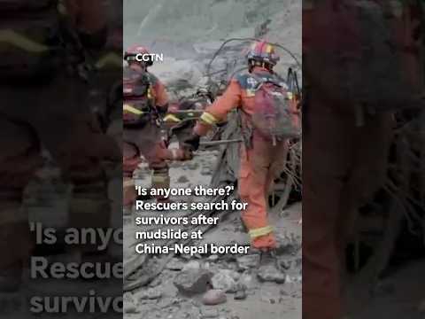 'Is anyone there?' Rescuers search for survivors after mudslide at China-Nepal border