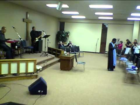 Evangelist Gene Martin singing a medley of gospel greats