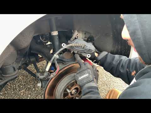 Acura TLX rear brakes and caliper compression.